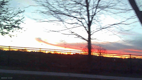 Sample footage captured with the mini keychain camera showing a warm sunset scene